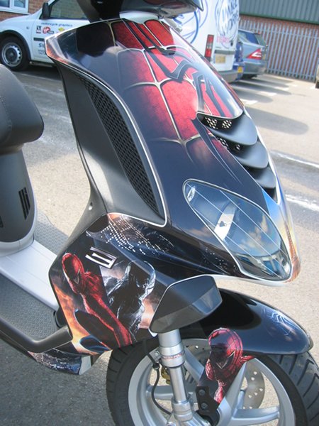 Spiderman moped shop